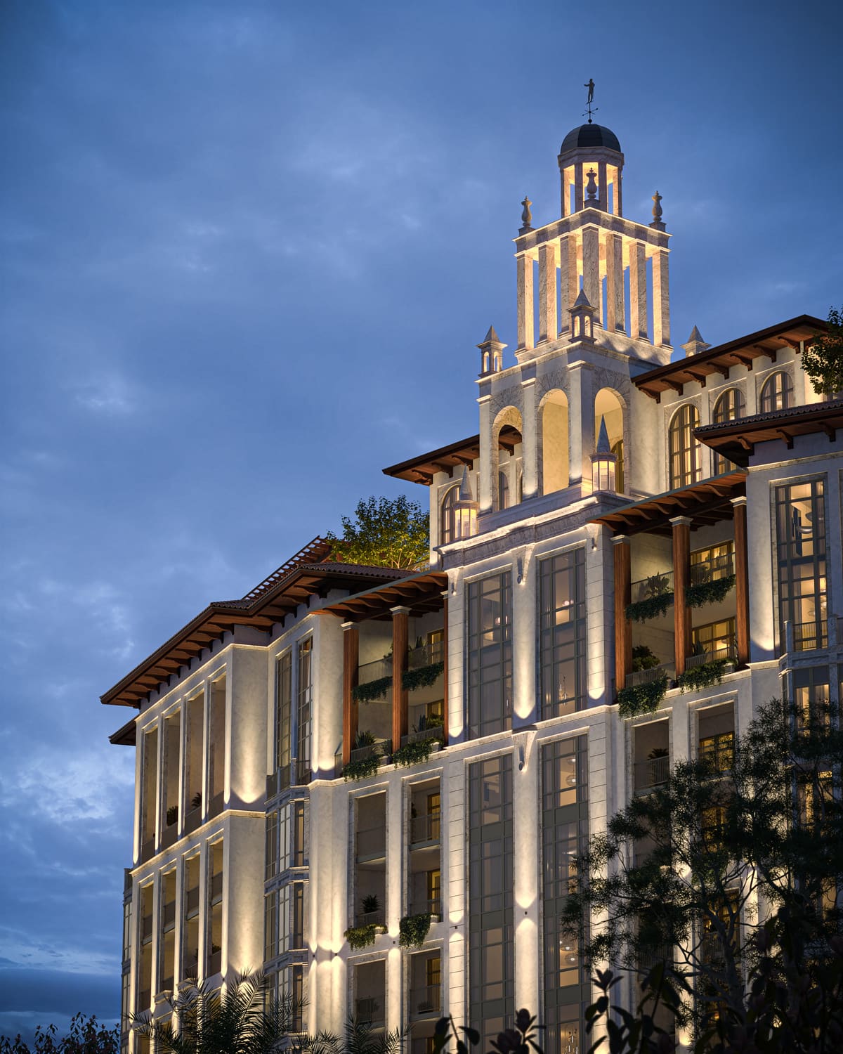 The corner tower and tiled roofline of Ponce Park Residences against an open sky