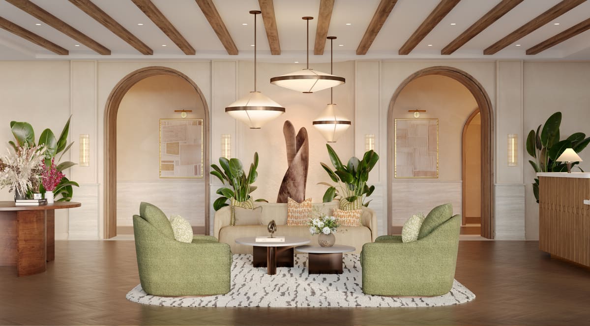 The private lobby lounge at Ponce Park Residences, with arched openings and seating beneath a beamed ceiling