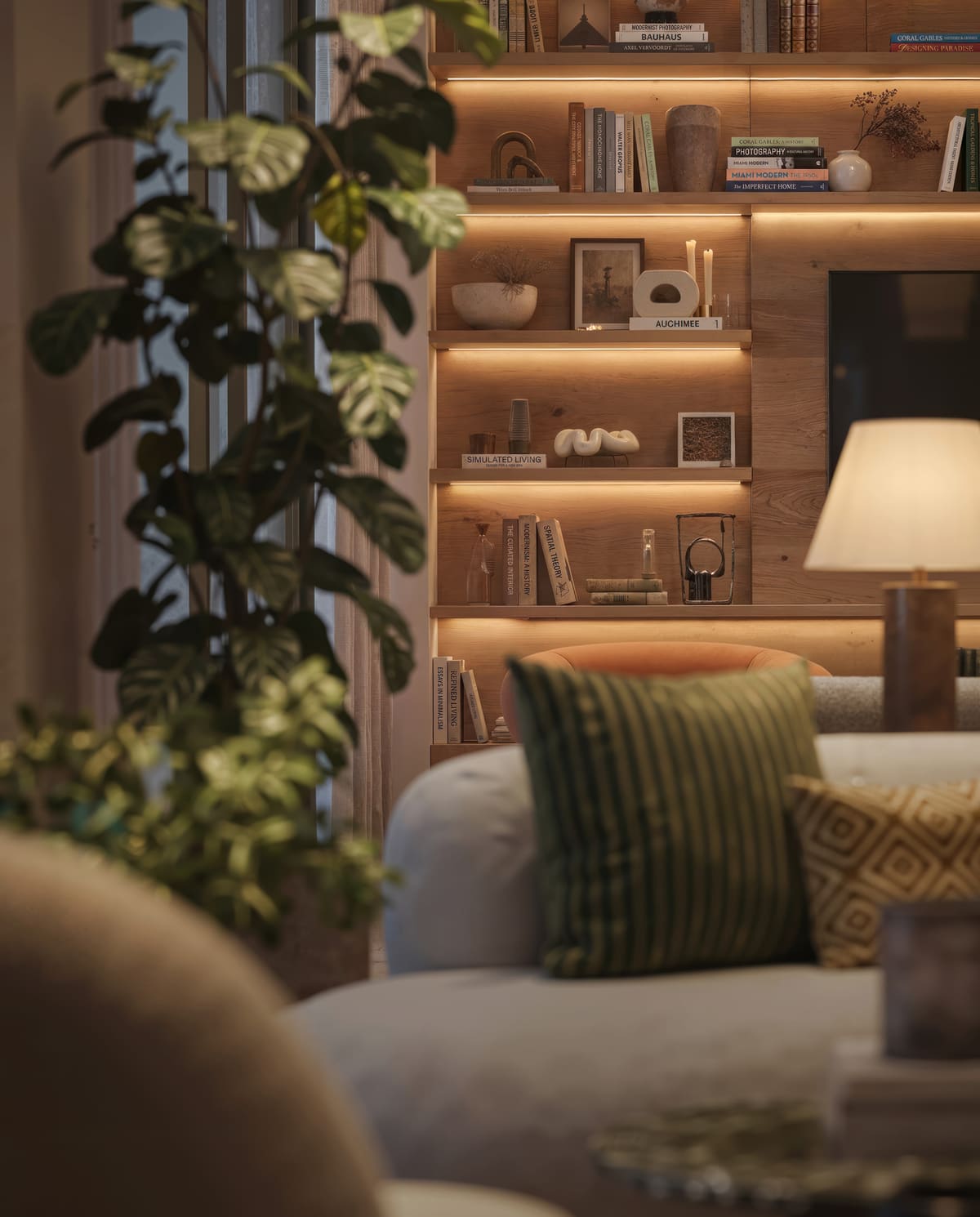 A great room at Ponce Park Residences, with European oak floors and a wall of built-in shelving