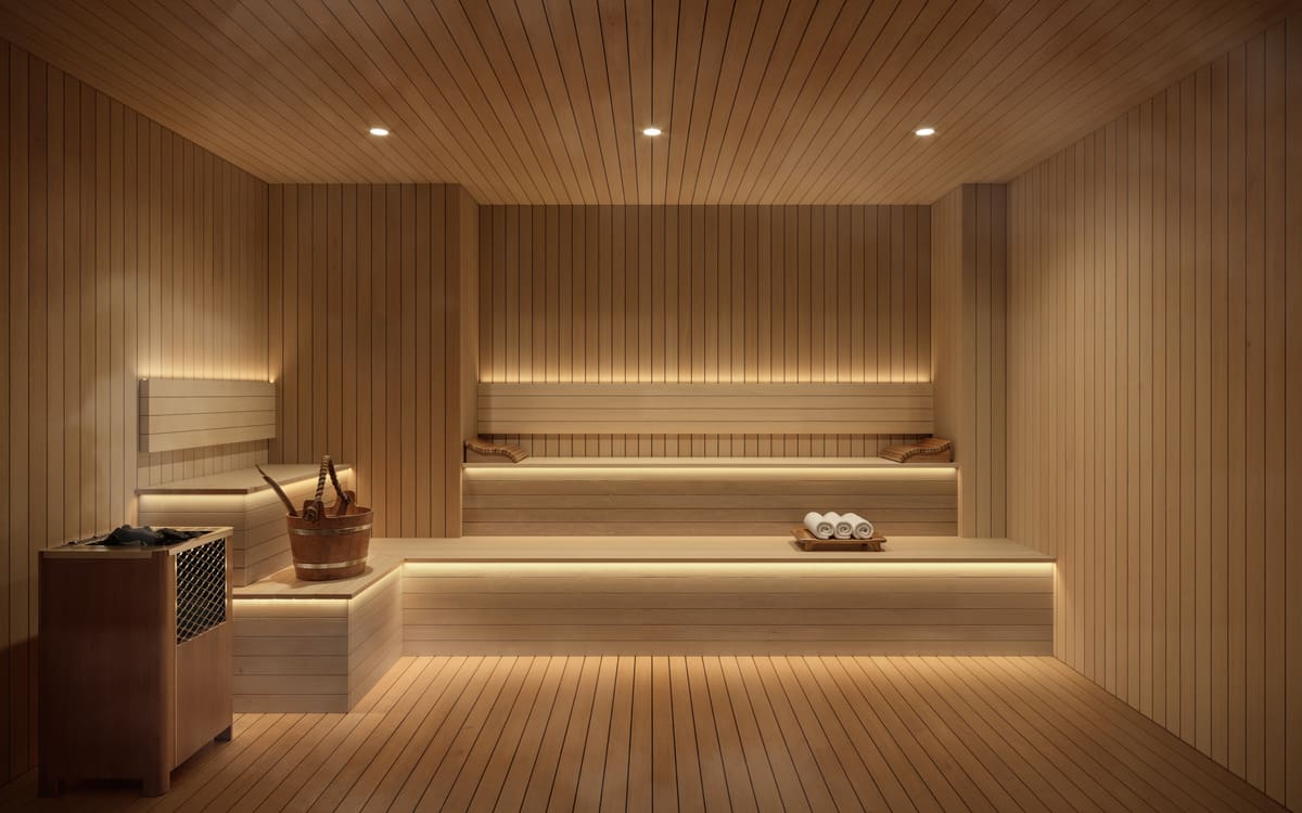 The timber-lined sauna at Ponce Park Residences with tiered benches and concealed lighting